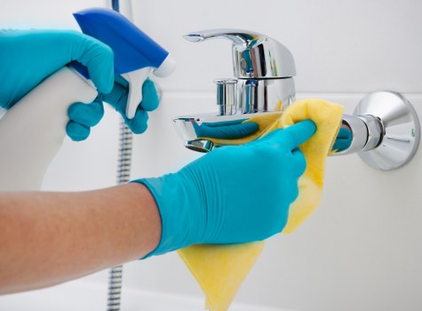Office cleaning team maintaining desks and workstations in Brent
